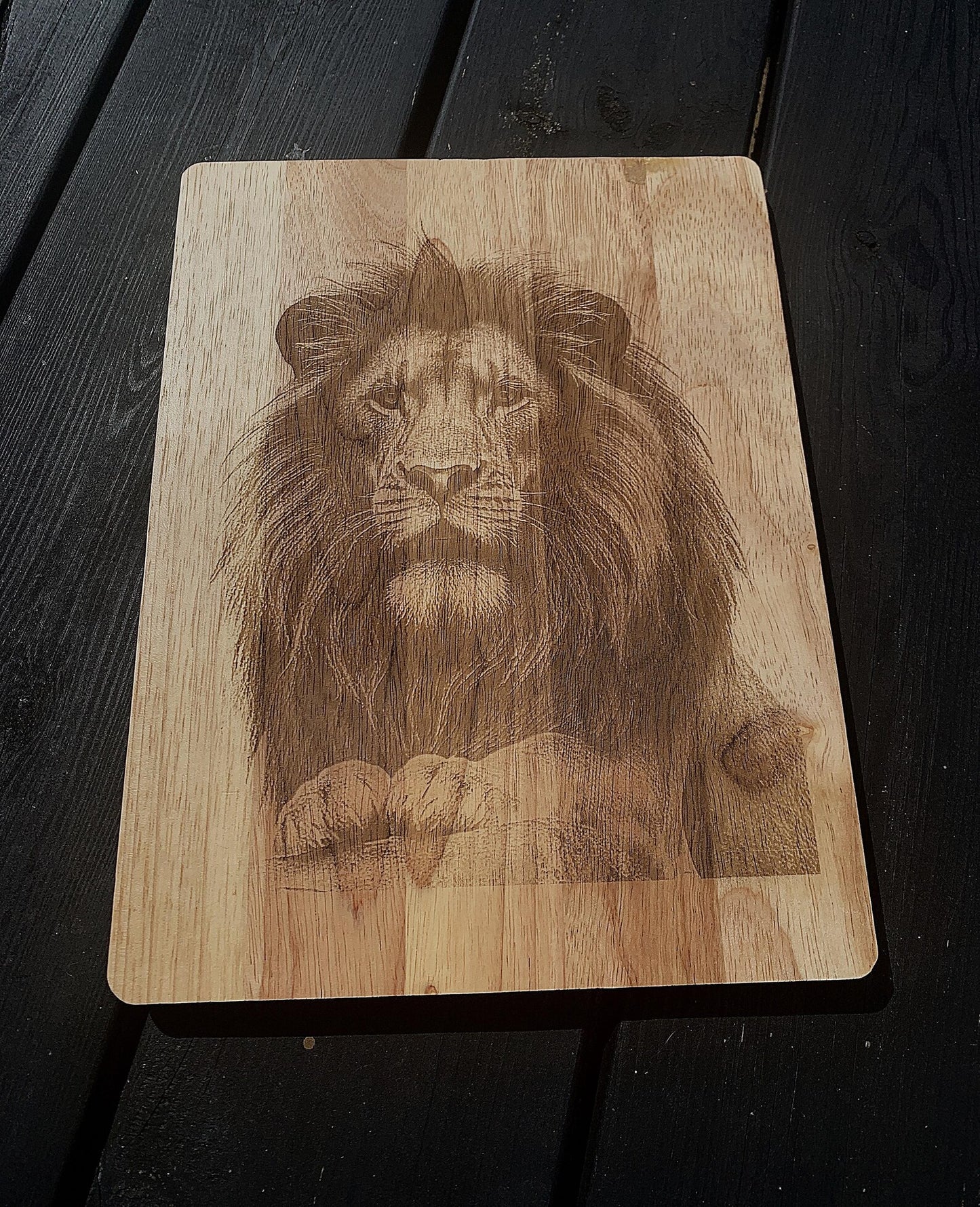 Animal engraved wooden chopping board