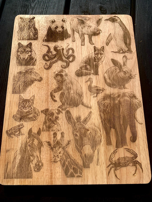 Animal engraved wooden chopping board